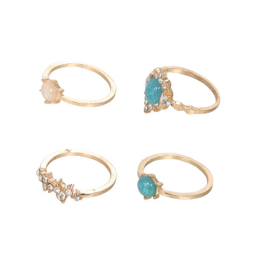 The 'Opalescent Harmony' 4-Piece Crystal Ring Set